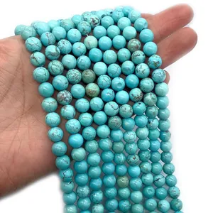 Gepolijste blauwe turquoise ronde kralen met natuurlijke textuur voor het maken van sieraden