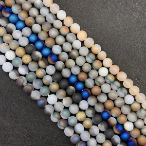 Detailed view of 8mm matte agate beads in blue, gold and pink for DIY jewelry making