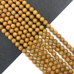 Perline rotonde in pietra naturale con venature del legno per creazione gioielli fai da te