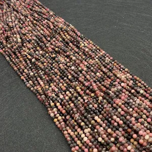 Macro view of 2-4mm faceted natural stone beads in pink and black for DIY jewelry making