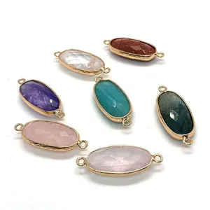 Set of 7 multifaceted oval gemstone pendants with gold-plated edges and double jump rings