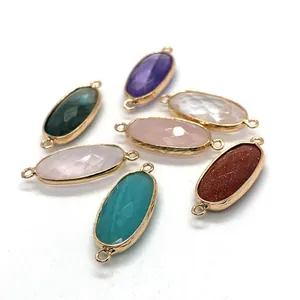 Oval gemstone connector charms in assorted colors with gold metal frames for DIY jewelry