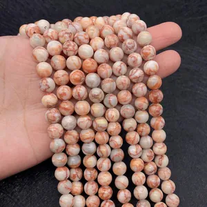 Macro shot of 6mm-10mm red network stone round beads for DIY jewelry making accessories
