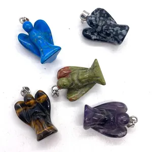 Set of five natural gemstone angel pendants including lapis, amethyst, and tiger eye