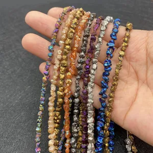 Macro view of metallic plated irregular stone beads in multiple colors for DIY jewelry