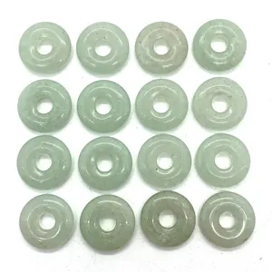 Set of 16 natural green aventurine donut pendants with polished smooth surface