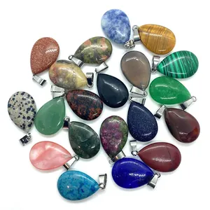 Various teardrop gemstone pendants including malachite and tiger eye with silver metal clasps