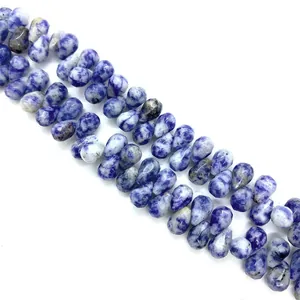 Faceted teardrop sodalite stone beads in deep blue with natural white vein patterns
