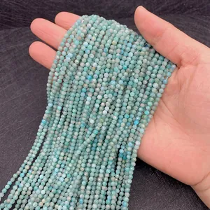 Close-up of faceted natural Amazonite 2-3mm beads for DIY jewelry making