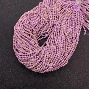 Macro shot of 2-3mm faceted lavender purple stone beads for DIY jewelry making