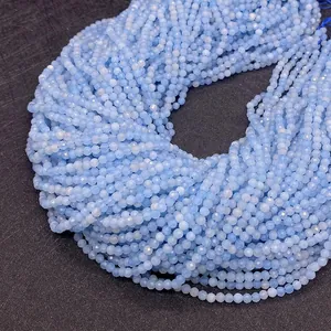Close-up of faceted 2mm light blue natural stone beads for DIY jewelry making