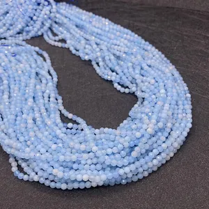Macro shot of 2mm faceted light blue natural stone beads for DIY jewelry making