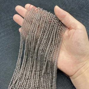 Vue détaillée de fils de perles de quartz fumé facettées 2-3mm pour création de bijoux DIY