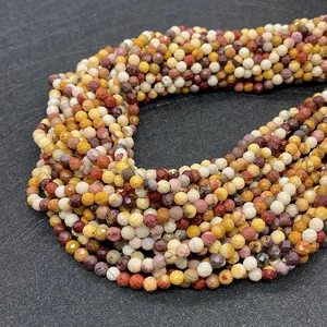 Macro detail of faceted jasper beads in earthy tones with precise natural stone textures