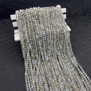 Macro shot of 2-4mm faceted labradorite beads with brilliant blue and gold flashes