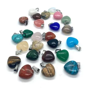 Polished heart-shaped gemstone pendants with silver bail in tiger eye and quartz