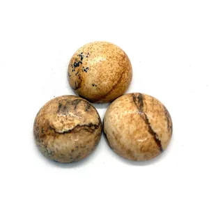Ensemble de trois cabochons polis en jaspe naturel aux motifs uniques de tons terre