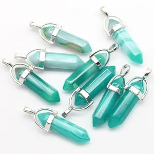 Detail view of green agate hexagonal crystal pendants with silver metal clasps