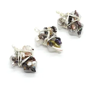 Irregular resin and freshwater pearl handmade wire wrapped pendant set on white background