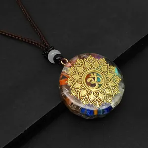 Orgonite energy necklace with colorful natural stones and gold mandala om symbol