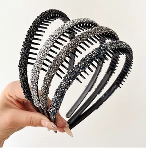 Close-up of sparkling rhinestone headbands with anti-slip teeth in multiple colors