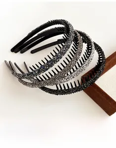 Detailed view of non-slip hairbands with sparkling rhinestones in four elegant colors