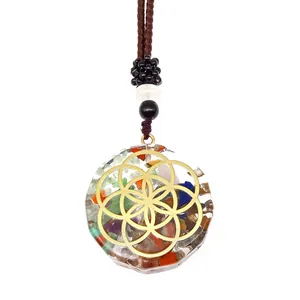 Rainbow natural stone resin pendant with gold Flower of Life symbol on brown cord