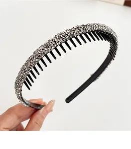 Detail of classic black headband with sparkling crystals and non-slip inner comb teeth