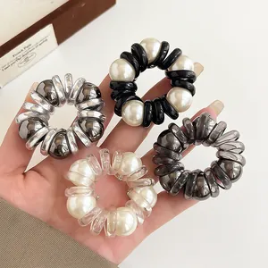 Elastic pearl hair ties in four colors with spiral telephone wire design for women