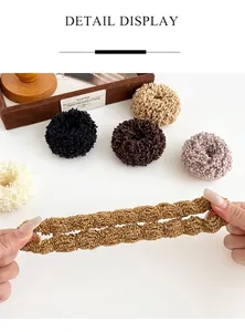 Detailed view of elastic plush hair ties in five colors showing stretch performance