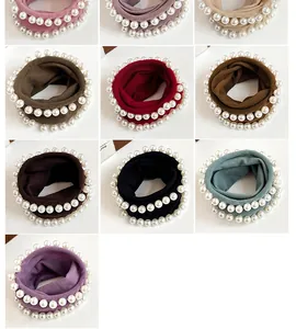 Collection of wide elastic pearl hair ties in ten different colors and soft fabric textures