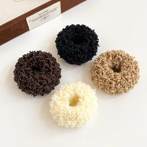 Thick plush hair ties in 4 colors including black and beige with soft teddy fleece texture