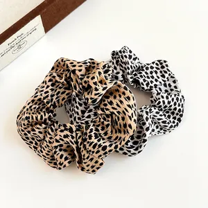 2-pack leopard print scrunchies in brown and white chiffon fabric for ponytail hair styling