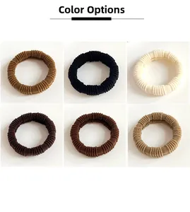 Close-up of high-elasticity hair ties showing ribbed texture in six neutral earth tones