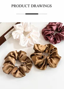 Set di quattro elastici in raso di seta nei colori crema, rosso, marrone e champagne in scatola