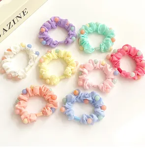 Huit chouchous élastiques aux couleurs acidulées avec perles décoratives colorées