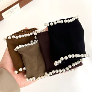 Set of four wide pearl-trimmed elastic hair scrunchies in assorted earthy colors
