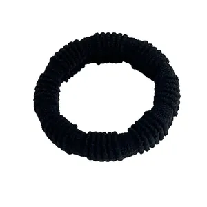 Durable high-elasticity black hair tie with ribbed texture for ponytail styling