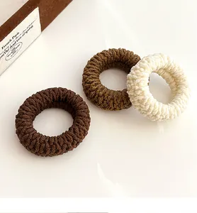 Detailed knit texture of high elasticity hair ties in cream and coffee tones set of 3