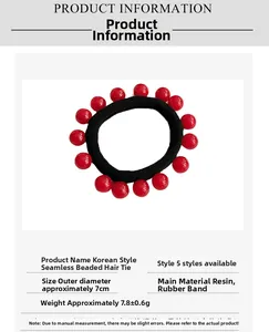 Détail d'un élastique à cheveux haute élasticité avec perles rouges et diamètre de 7cm