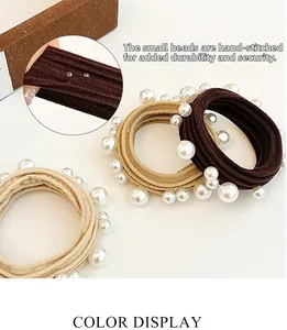 Detail of durable elastic hair ties featuring secure hand-sewn faux pearls