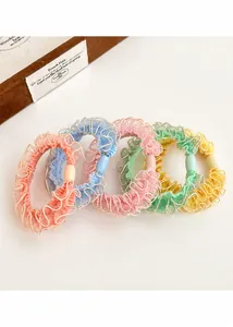 Set di quattro elastici per capelli a pieghe pastello con perline opache in organza