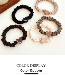 Detailed set of 5 elastic scrunchies in coffee tones with heart-shaped rhinestone charms