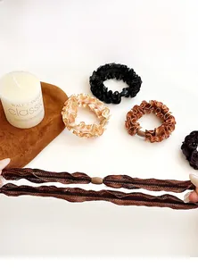 Detail display of textured mesh hair ties with wood buckles and high elastic structure