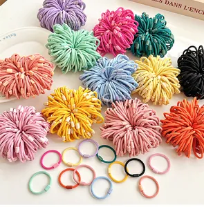 Close-up of vibrant elastic threaded hair ties with matching plastic buckles