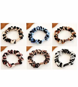 Set de 6 coleteros de satén elástico con estampados de leopardo y animales en varios colores