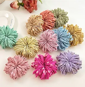 Close-up of colorful high-elasticity braided hair ties with matching plastic fasteners