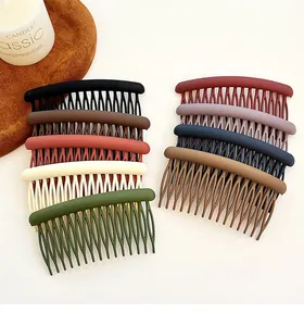 Detailed view of matte wave-shaped hair side combs in a variety of elegant colors