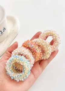 Close-up of assorted pastel ice cream colored hair ties in textured fluffy material