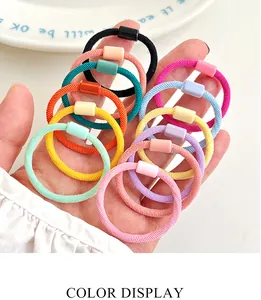 Detail of colorful ribbed elastic hair bands with matching resin beads for children